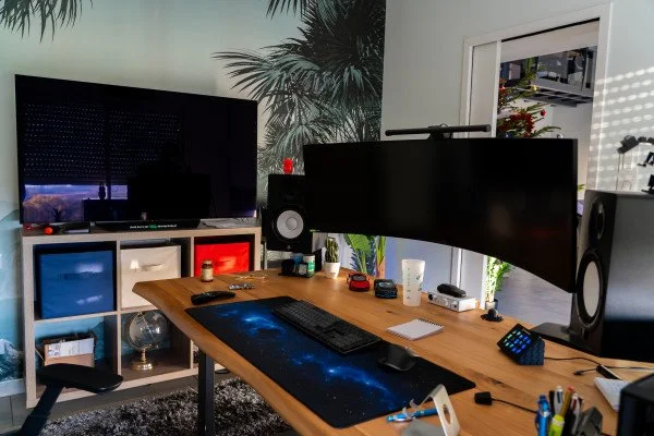 OctoGency production setup — ultrawide monitor and pro gear